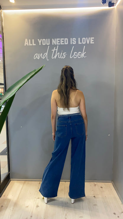 JEANS BRILLANTE CON CINTURÓN