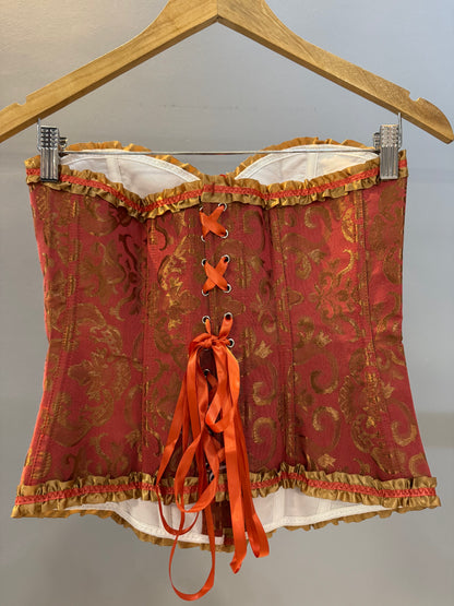 CORSÉ VICTORIANO NARANJA DETALLES DORADOS