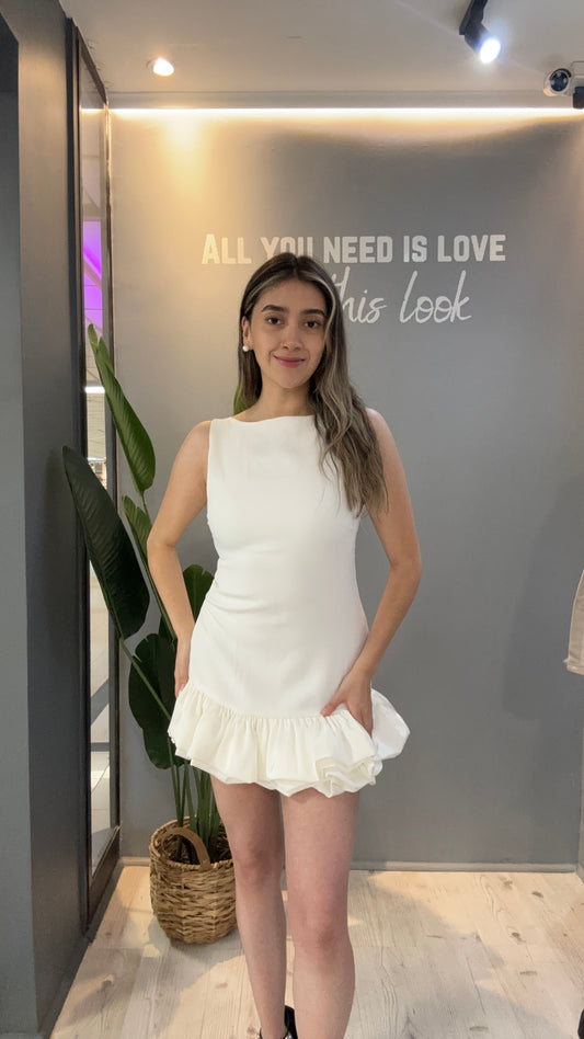 VESTIDO LISO CON VUELOS