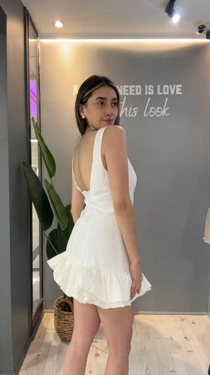 VESTIDO LISO CON VUELOS